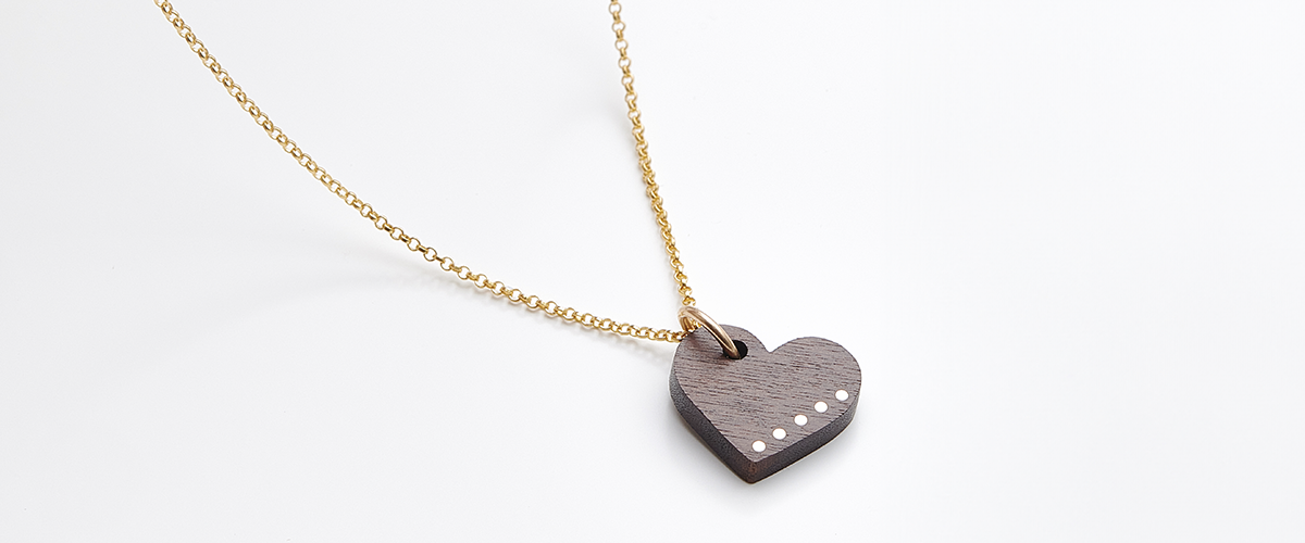 The History of Wood Jewelry: A Sustainable & Stylish Choice